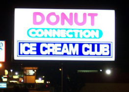 Donut Connection Sign at Night